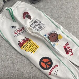 Forever 21 White Jogger Pants with Green Trim and Multicolor Graphics